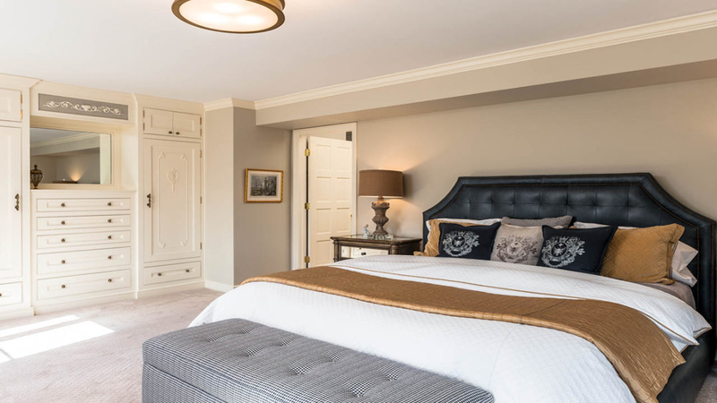 sophisticated-master-suite-bedroom-built-in-cabinet